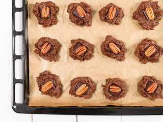 Setting Pecan Chocolate Cookies In Tray Before Cooking In Oven