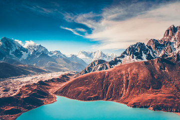 Himalayas. View from Gokyo Ri, 5360 meters up in the Himalaya Mountains of Nepal, snow covered high peaks and lake not far from Everest. - obrazy, fototapety, plakaty