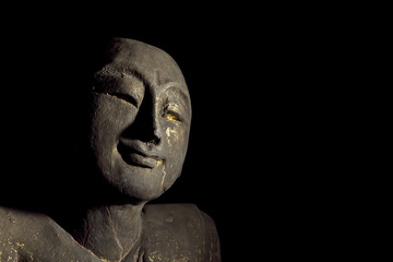 Fototapeta na wymiar Traditional Enlightened Buddhist Monk Statue