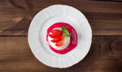 closeup italian dessert Pannacotta with strawberries
