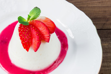 closeup italian dessert Pannacotta with strawberries