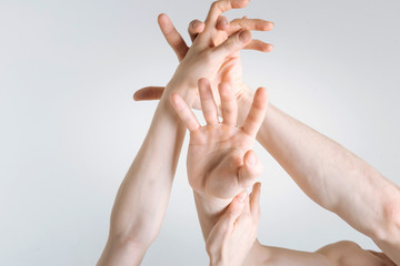 Powerful athletes hands demonstrating aggression in the studio