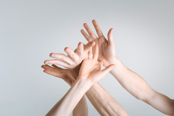Lively athletes hands showing grace in the studio