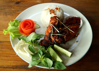 Ayam Bakar or Indonesian grilled chicken. Popular dish in Indonesia