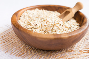 Rolled oats, porridge  for a healthy breakfast in a rustic style