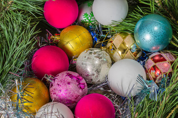 Christmas composition with beautiful balls and spruce branches.