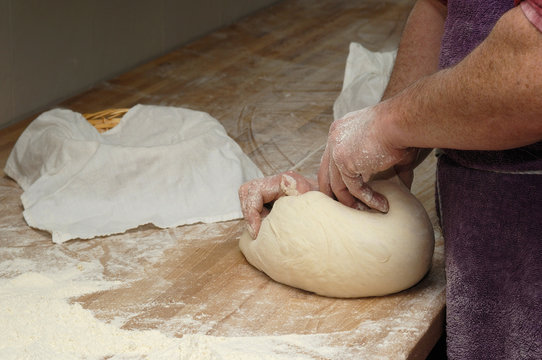 Baker making bread