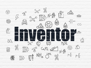 Science concept: Inventor on wall background