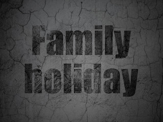 Vacation concept: Family Holiday on grunge wall background