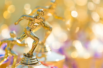 close up of track and field running trophy