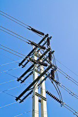 Electric power line pole in the sky