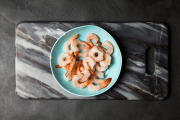 Shrimps slate background
