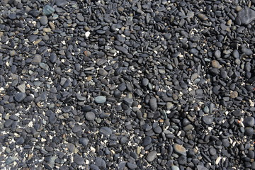 Soft feather against hard stones