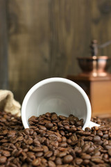 Fresh coffee beans with a cup
