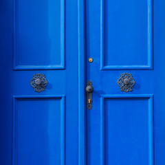 Traditional european vivid blue entance door close-up