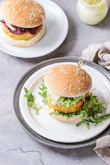 Vegan burgers with avocado, beetroot and sauce