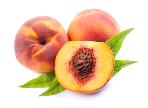 Peach with leaves .