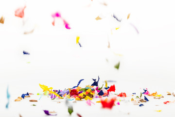 Colored confetti isolated on white