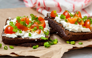 Sandwiches with healthy rye bread, feta and green onions. Love for a healthy food concept