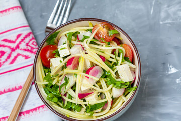 Zucchini pasta with tofu in a bowl. Love for a healthy vegan food concept