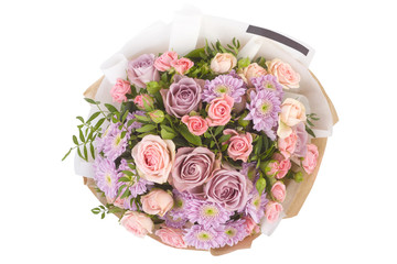 Bright buketny composition from fresh flowers, the white isolated background