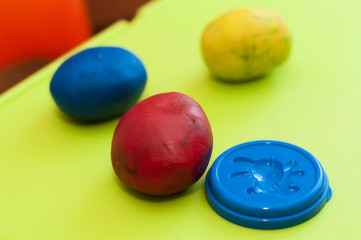 colored plasticine dough on a table