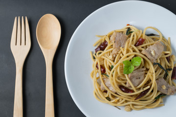 Spicy spagetti with stir-fried pork , dried chilli and basil : Thailand style food