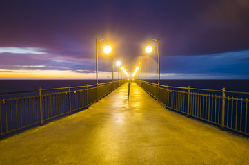 Fototapeta na wymiar pier overlooking the sea after sunset