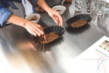 Roasted beans in black plates