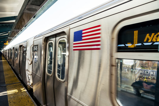 J Train Arriving At Station