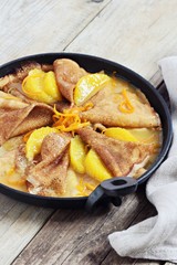 Pancakes with orange sauce. Crepes Suzette. Selective focus