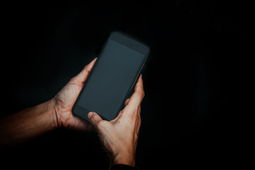 Close up of people hand using smartphone in technology and socia