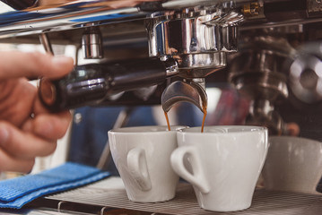 Small cups filling with drink