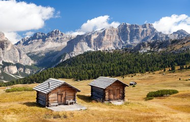 Fototapeta na wymiar wooden small cabin in dolomities alps mountains