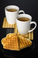 Tea and coffee with biscuits as the heart.