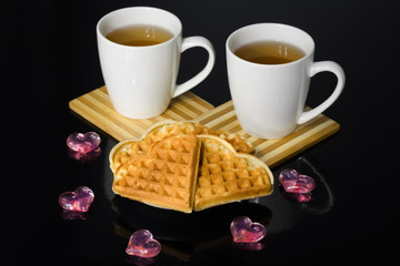 Tea and coffee with biscuits as the heart.