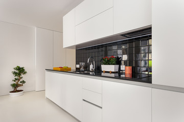 Bright black and white kitchen