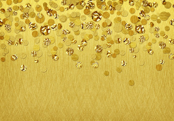 Background with scattered gold confetti