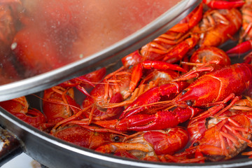 Crayfish in the pot and boiling water preparation
