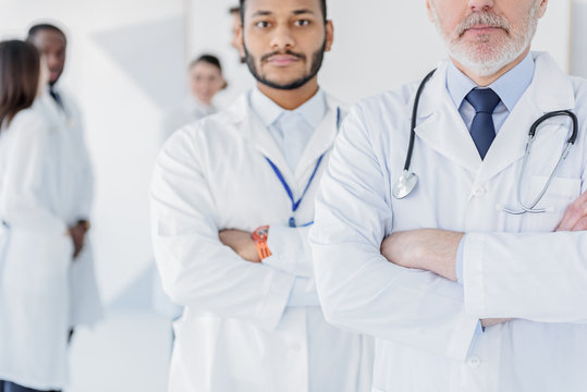 Professional physicians posing with confidence