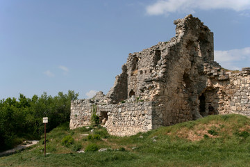 Fototapeta na wymiar Stony ruins of the medieval fortress Mangup Kale in Crimean Mountains, Crimea. 