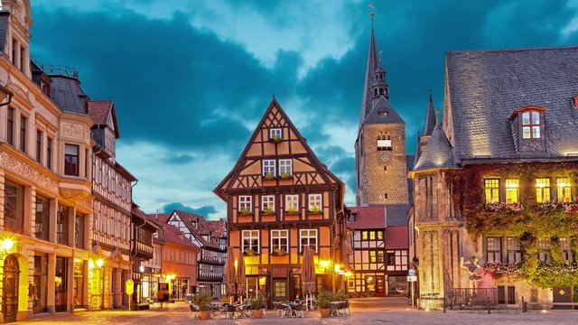 Half-timbered house on Market Square of Quedlinburg in the evening, Germany  (static image with animated sky)
