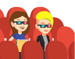 Happy friends watching 3D movie in the theatre.