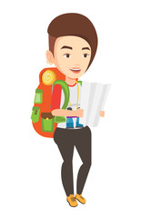 Traveler with backpack looking at map.