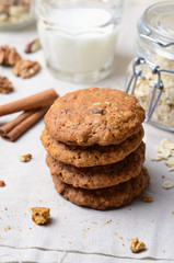 Homemade Oatmeal Cookies with Walnut and Cinnamon on bright background