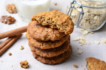 Homemade Oatmeal Cookies with Walnut and Cinnamon on bright background