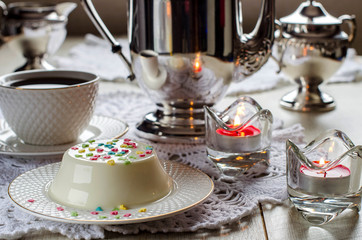 Panna cotta on a beautifully laid table