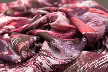 Violet light cloth, fabric, textile with a lot of folds, plaits , creases