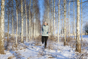 Jogging female in winter