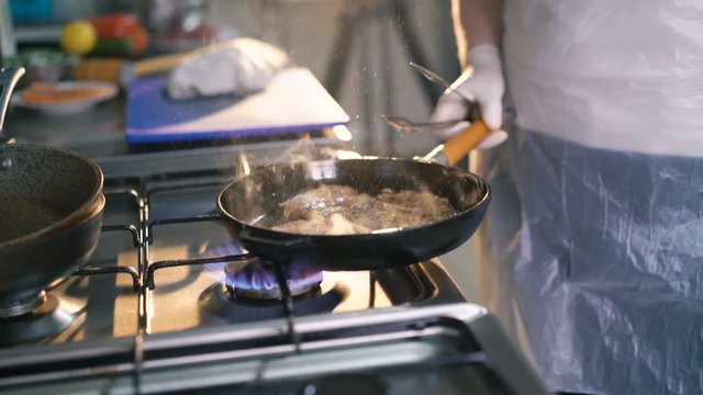 Close up of meat's frying in 4K